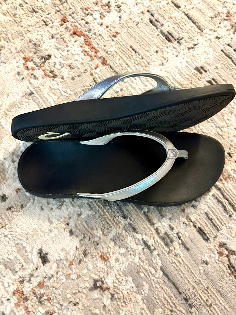 Olukai Silver Metallic Flip Flops with Black Soles - Picture 2 of 6